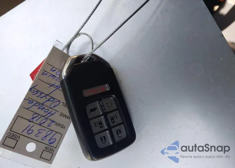 2018 Honda Odyssey Elite z USA, uszkodzony, nr VIN 5FNRL6H90JB097224